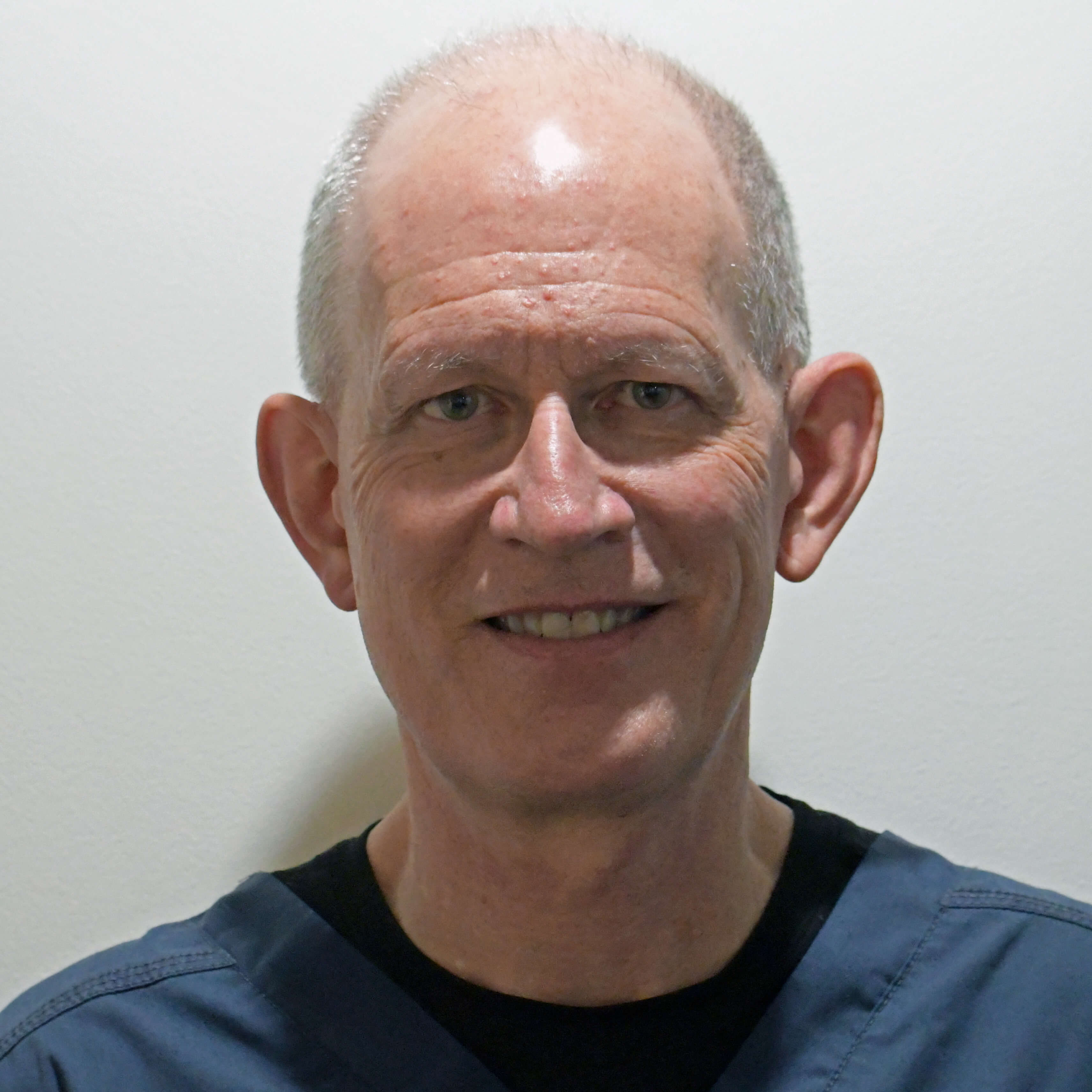 Dentist Norman Crepon headshot